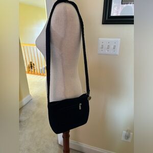 The Sak navy blue purse.